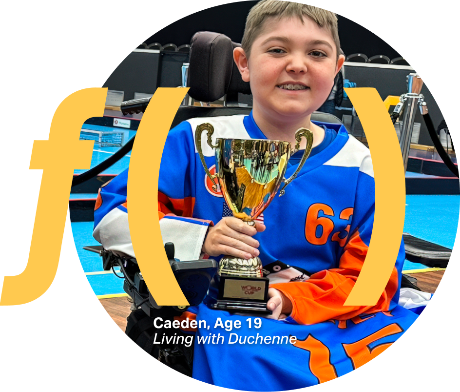 A boy using a wheelchair holding a gold trophy at a sports venue, wearing a blue and orange jersey, with on-image text reading “Caeden, Age 19, Living with Duchenne.”